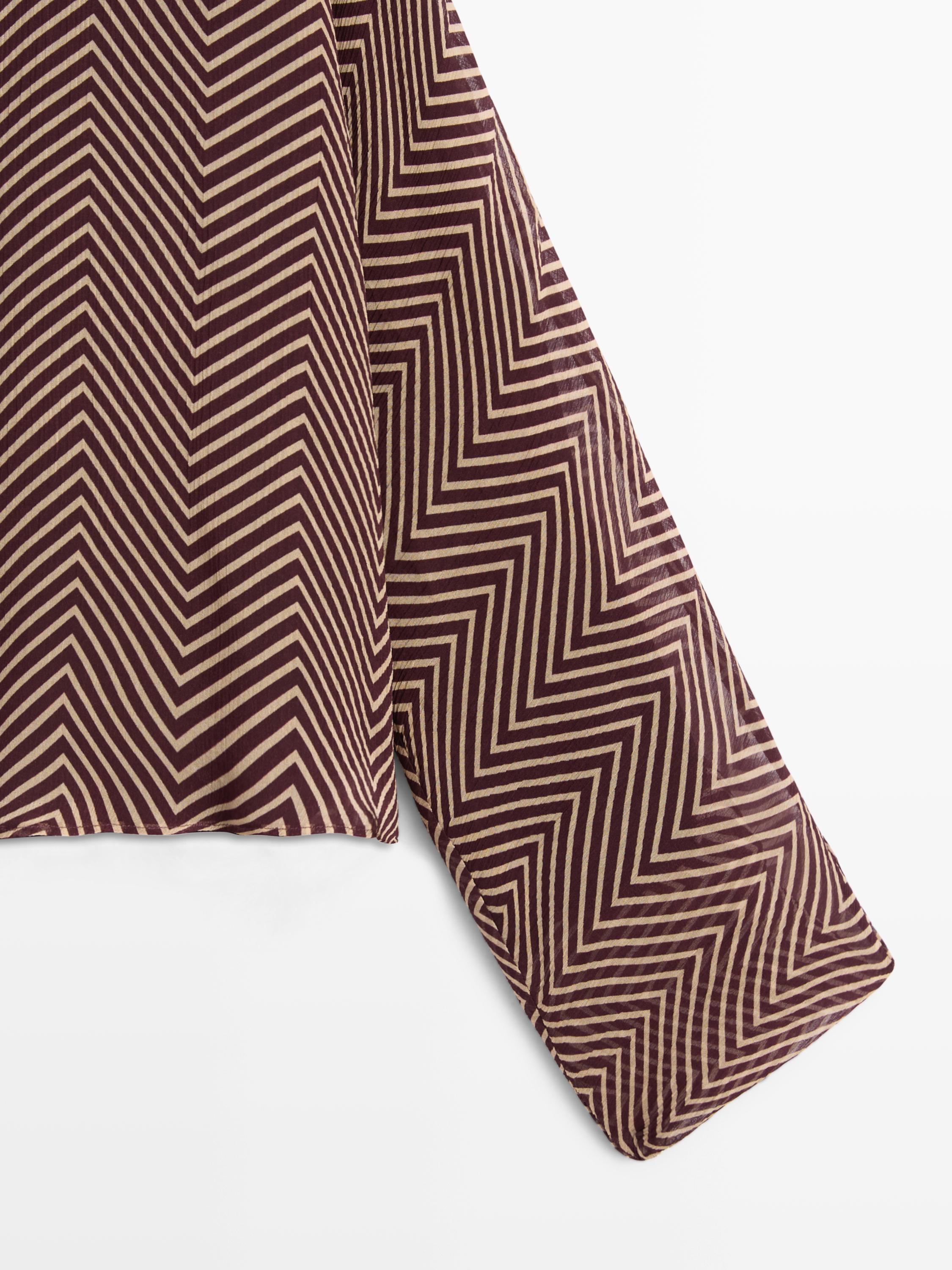 Flowing geometric print blouse